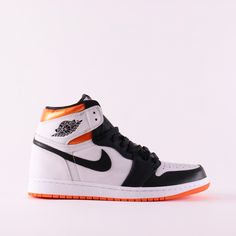 This reiteration of the 1985 Jordan 1 timeless classic in a new Electro Orange colourway released on July 17th, 2021. * White and black upper * Electro Orange outsole, collar, tongue and insole* Legendary timeless silhouette * Black toe classic design Size and Fit* Fits true to size Cute Nike Shoes, Sneaker Stores, Cute Nikes, Nike Air Jordan 1, Air Jordan 1 Retro, Jordan 1 Retro High, Nike Cortez Sneaker, Shoes Nike, Air Jordan 1