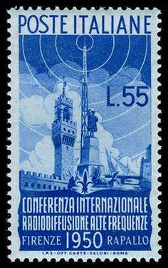 a postage stamp with an image of a tower in the sky and clouds above it