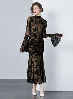 Mystique becomes tangible in this delicately crafted black lace dress that exudes both elegance and sensuality. A sheer overlay with intricate floral patterning cascades over a sleek, form-fitting underlay, creating a dance between concealment and revelation. The full-length sleeves bloom into fluted cuffs, adding a touch of dramatic flair, while the high neckline balances the ensemble with a touch of traditional grace. Perfect for gala events or sophisticated soirées, this dress demands attenti Push Up Swimsuit, Sleeveless Dresses Casual, Printed Tankini, Cute Couple Halloween Costumes, Gala Events, White Maxi, Black Lace Dress, Pink Midi Dress, Maxi Dress Party