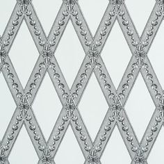 an image of a pattern on the side of a wall with white and grey colors