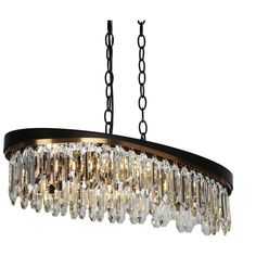 a chandelier hanging from a chain with crystal drops on it's sides