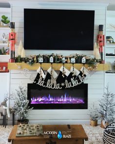 a living room decorated for christmas with holiday decorations on the mantel and fireplace mantle