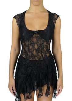 Meet your new favorite statement piece, the Cherie Top in Black. This lace baby doll top is crafted from intricate lace with double lined cups for the ultimate combination of comfort and allure. She is the perfect choice for everything from a romantic date night to a stylish layering piece. Details Bustier stitching Double-lined cups *Comes with ivory bow detail instead of black* 90% Poly 10% Spandex Dry Clean only Hand-made with ♡ Size & Fit If you are in between sizes, we recommend sizing up M Crochet Lace Camisole Top, Black Lace Corset With Lace Trim, Sleeveless Lace Corset With Lace Top, Flirty Lace Tops, Party Tops With Lace Trim And Underbust Shape, Lace Top With Contrast Detail For Party, Fitted Lace Flirty Top, Lace Coquette Camisole Top, Black Lace Trim Camisole Top