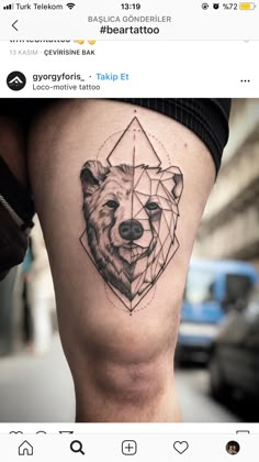 a bear tattoo on the side of a woman's thigh, with geometrical design