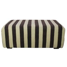 a black and white striped ottoman