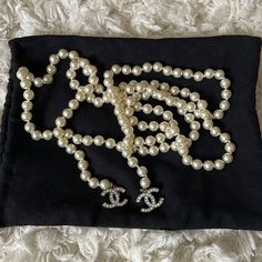 Long Pearl Strand. Wrap Around Neck And Knot At Height You Desire. No Closure. Cc Logos On Both Ends Of Necklace. Two Stones Missing In Cc Logos. One Stone Missing On Each Of Logos. Logo Is Double Sided. Authentic. Will Be Appraised By Poshmark Before Going To Sender. No Bag Included With This Purchase. Item Will Be Securely Wrapped In Bubble And Placed In A Non Chanel Branded Bag (Not Pictured). Luxury Evening Jewelry With Round Beads, Luxury Jewelry With Round Beads For Evening, Chanel Pearl Necklace, Chanel Pearl, Jewelry Chanel, Chanel Brand, Chanel Pearls, Pearl Strand, Chanel Accessories