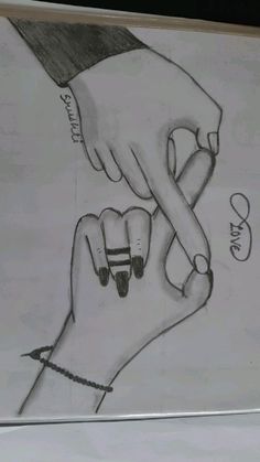 a drawing of two hands holding each other