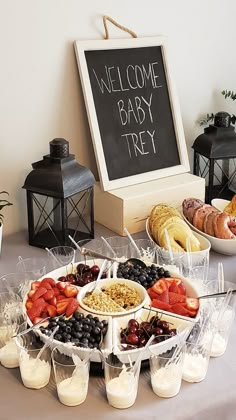 a welcome baby tray with strawberries, blueberries, bananas and yogurt