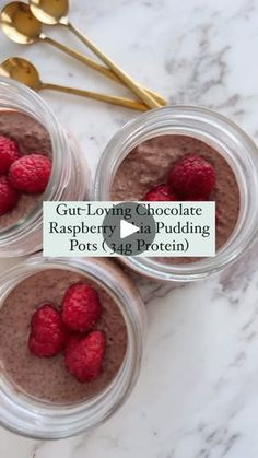 three small cups filled with raspberry chocolate pudding