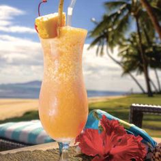 a drink sitting on top of a wooden table