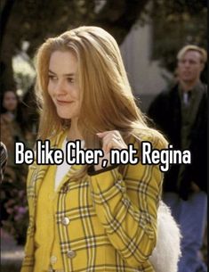 a woman in yellow jacket holding a cell phone with the words be like cheer, not regina