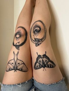 two women with tattoos on their legs, one has a butterfly and the other has an eye