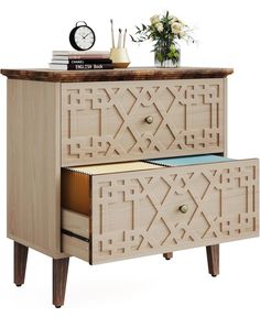 a wooden cabinet with two drawers next to a clock and flowers on the top shelf