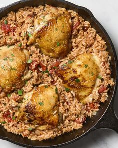 chicken and rice in a cast iron skillet