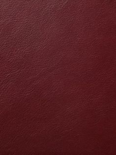 a red leather texture background or wallpaper