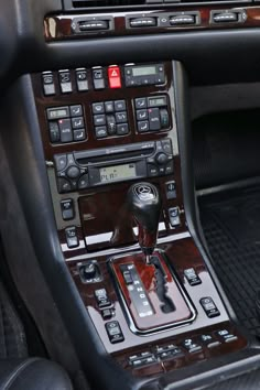 the interior of a car with buttons and controls