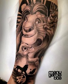 the lion king tattoo on the arm