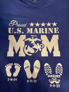 marine mom t - shirt with footprints and stars on the front, navy blue background