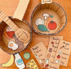 an assortment of food items are shown in cardboard bowls on a wooden table with tags and stickers