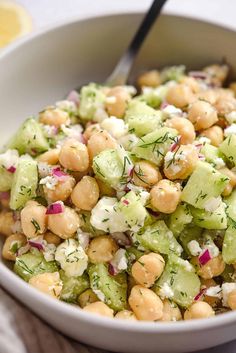 chickpea cucumber feta salad in a white bowl