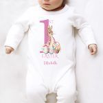 Celebrate your little bunny's 1st Easter in style! This printed rompersuit is as cute as it gets and makes for a memorable keepsake. 🐣✨ #eastergiftideas #babygirlstyle #memorablemoments #AmazonUK #HoolarooUK Baby Teething Toys, Pink Bodysuit, Bunny Designs