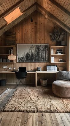 a living room with wood paneled walls and flooring