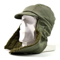 Original French army winter hat. Fully lined Dark Green / Olive Drab With faux Fur. Side Ear Flaps With Velcro Fastening Hat is brand, new Adjustable Windproof Military Hat, Winter Military Cap, Winter Military Hat For Outdoor Activities, Military Style Winter Hat For Outdoor Activities, Military Hats For Winter Outdoor Activities, Winter Khaki Cap, Khaki Winter Cap, Winter Hunting Cap, Khaki Brimmed Winter Hat