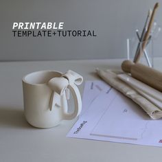 This Bow Mug Pottery Template & Slab Building Tutorial is a brilliant DIY pottery project for those looking to explore the world of ceramics design without the need of a fully equipped studio. The template comes with full bow templates & in-depth instructions to help you create this stunning masterpiece. The beautiful curvature of the mug is created by using a darting technique, elevate your pottery game with this hand building ceramics project. Skill Level (recommended) : INTERMEDIATE If you ha Project Printable, Pottery Games, Sponge Paint Brush, Mug Pottery, Sponge Painting, Bow Template, Keramik Design, Diy Pottery, Beautiful Home Decor