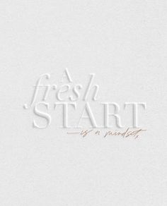 the words fresh start are written in white paper