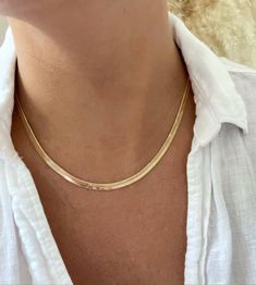 The Halo Herringbone Chain Necklace  D E T A I L S - Gold Filled Chain - 16", 18" or 20" Length of Chain - 4mm Thick - Lobster Clasp Closure M A T E R I A L S At Dylan Rae, we are committed to handcrafting jewelry that is perfect for everyday wear. Our high-quality gold filled designs contain 100+ times more real gold than gold plated components. The thick outer layer of gold makes it highly durable and safe for people with allergies or sensitive skin. C A R E Care for Your Gold Filled Jewelry: Necklace Snake Chain, Necklace Snake, Herringbone Chain, Snake Chain Necklace, Herringbone Necklace, Necklace Layering, Gold Choker, Layering Necklace, Gold Filled Jewelry