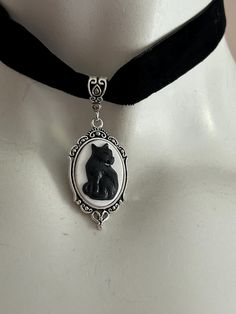 Black cat choker necklace  Very light, silver plated with lobster clasp Plastic pendant, no tarnish Adjustable chain 12-14 inches For more animal jewelry: Www.etsy.com/shop/Ashley3535 Cat Choker, Jewelry Black, Black Choker, Cat Jewelry, Black Cat Halloween, Cat Necklace, Halloween Jewelry, Black Necklace, Gothic Jewelry