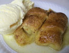 a white plate topped with dessert and ice cream