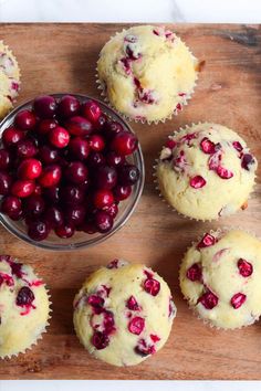 cranberry muffins and cupcakes on a cutting board