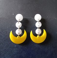 "Pretty Soldier Sailor Moon Cosplay Earrings are made of laser cut yellow acrylic and white acrylic. ★ Super lightweight and perfect for detailed cosplay, these dangle pendants are secured upon your choice of studs. Pick from: ~Nickel Free (Shown) ~Stainless Steel ~Plastic Studs ~Clip Ons ~Titanium Studs ★ Costume Jewelry pendants measure just under 1.5\" long and .75\" wide each. ★ Fighting evil by moonlight, wining love by daylight. Never running from a real fight! She is the one named Sailor Sailor Moon Brooch, She Is The One, Moon Cosplay, Sailor Princess, Pastel Girl, Sailor Moon Cosplay, Anime Jewelry, Princess Cosplay, Usagi Tsukino