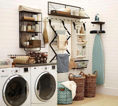 an image of a laundry room with washer and dryer