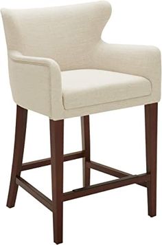 a white upholstered bar stool with wood legs