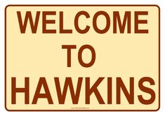 a welcome to hawks sign with the words welcome to hawks in brown on a white background