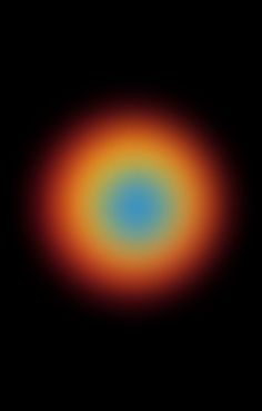 an orange and blue circle on a black background