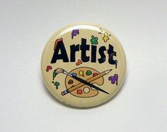 a button with the words artist painted on it