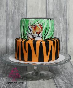 there is a cake decorated with an image of a tiger