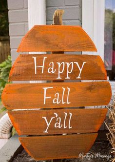 a wooden sign that says happy fall y'all