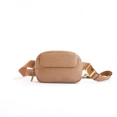 Keep your essentials close with our ANYWHERE belt bag. Don't be fooled by its size - we've packed plenty of functionality and intentional storage into this petite bag.  It comes with a card holder that fits securely in an interior slip pocket, has an easy adjust webbing strap and can be worn as a traditional belt bag o Traditional Belt, Camel Outfit, Crossbody Belt Bag, Daily Bag, Leather Belt Bag, Sling Bags, Webbing Strap, Belt Bags, Window Shopping