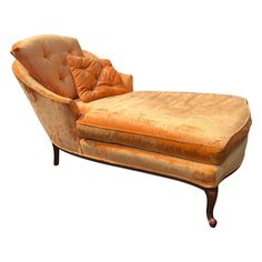 an antique chaise lounge chair with gold velvet upholster and tufted cushions