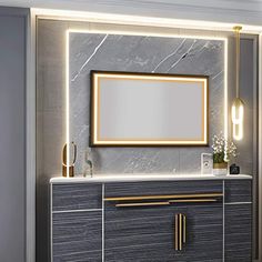 a bathroom vanity with a mirror above it and lights on the side wall behind it