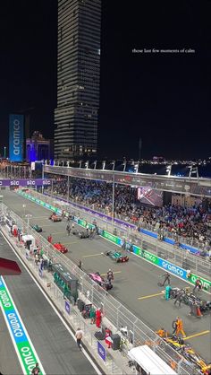 an aerial view of a race track at night