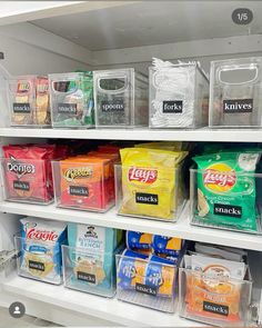 the shelves are filled with many different types of food and containers on them for storage