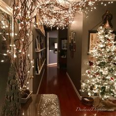 the hallway is decorated for christmas with white lights