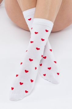 Give your wardrobe some love with our Heart Socks! Each pack contains 4 pairs of socks with different colored hearts. (We recommend sharing with your loved ones.)  The fine cotton blend of the yarn naturally absorbs moisture while allowing you to wear tight fitting shoes.  Made in Los Angeles, Calif. Our experienced sewers earn up to $25 an hour and no less than $17.25; additionally workers have healthcare benefits for less than $15 per week, a 401k plan, paid sick days, subsidized bus passes and favorable overtime benefits.  • Each Pack contains 4 pairs. • Made in Los Angeles, Calif. • 79% Cotton / 19% Nylon / 1% Elastane Lace Knitwear, Denim Short Jumpsuit, Heart Socks, Bus Pass, Kids Garments, Leather Denim, Pet Home, Kids Swimming, Gift Card Sale