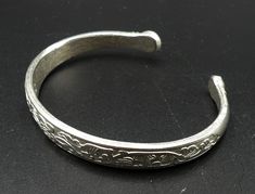 "Vintage silver tone Chinese style cuff, In good vintage condition. Measures 2\" ¾ x 2\" ¼ ( out side edge to edge ). 2\" 5/8 x 2\" ( In side edge ) and 8 mm thick. Thanks." Adjustable Etched Silver Cuff Bracelet, Nickel-free Silver Bangle Cuff Bracelet, Adjustable Silver Etched Cuff Bracelet, Silver Etched Metal Cuff Bracelet, Adjustable Stamped Antique Silver Cuff Bracelet, Silver Etched Cuff Bracelet, Nickel Free Silver Cuff Bracelet, Nickel Free Silver Cuff Bangle, Etched Silver Metal Cuff Bracelet