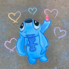 a drawing of stitch - o - life on the ground with hearts drawn in chalk